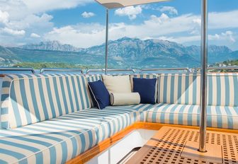 chic outdoor seating area on the sundeck of motor yacht Cheetah Moon