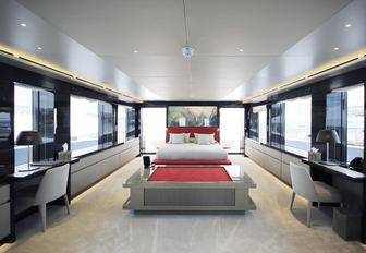 upper deck master suite with tall windows on board superyacht My Eden