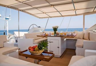 Bimini-covered cockpit aboard luxury yacht KAWIL