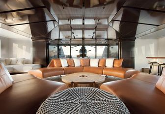 the curvaceous and stylish interior of charter yacht cloud breaker provides the perfect spot for friends and family to unwind while they are on their self isolation luxury yacht charter vacation 