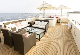 seating area and Jacuzzi on board charter yacht Beverley