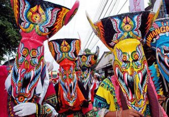 Colorful costumes and headresses at the festival in Penang