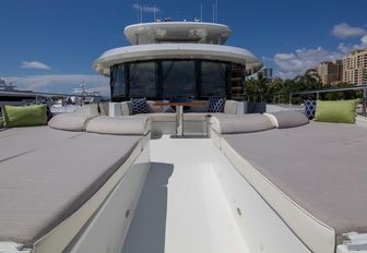sun pads and seating area on the Portuguese bridge of motor yacht The Rock 