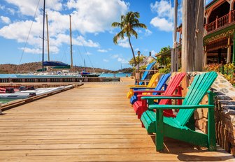 Adirondack chairs on a dock on Virgin Gorda Island, BVI