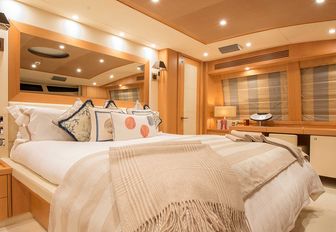 light and airy oak-paneled master suite aboard superyacht EMOJI 