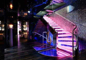 spectacular entryway with LED-lit staircase on board motor yacht Sea Force One
