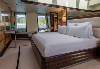 skylight looks over a double bed in the master suite aboard luxury yacht GLADIATOR 