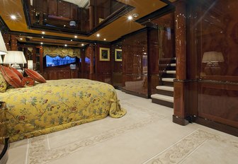 spacious master suite with lacquered mahogany aboard luxury yacht ULYSSES 