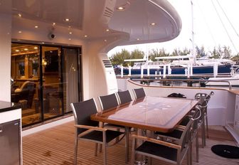 alfresco dining on the main deck aft of luxury yacht ‘Mystic Tide’ 