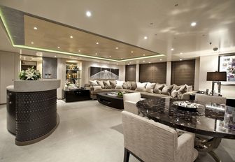 monochromatic skylounge with bar and seating aboard luxury yacht ‘Hurricane Run’ 