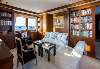 snug library area aboard charter yacht PIONEER