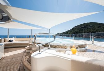 private Jacuzzi with Bimini cover on the sundeck of luxury yacht RoMEA 