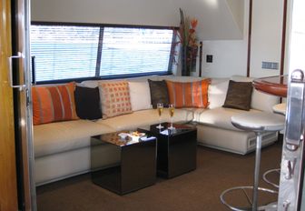 bar and seating area in skylounge aboard motor yacht ‘Costa Magna’