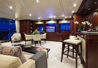 skylounge with bar, sofa and games table aboard charter yacht ‘Pure Bliss’ 