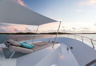 sunning spot covered by optional bimini on bow of superyacht UNBRIDLED 