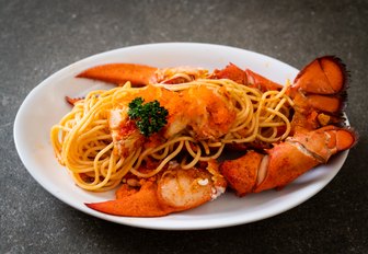 Italian dish of lobster with spaghetti