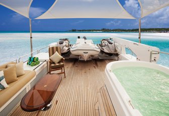 Spa tub and lounging area covered by bimini on board luxury yacht ‘Second Love’ 