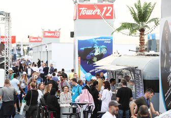 show-goers walk among the exhibits at the Dubai International Boat Show 2018