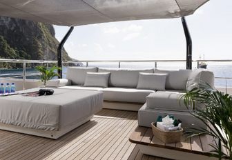 chic outdoor seating area on board charter yacht LAURENTIA 