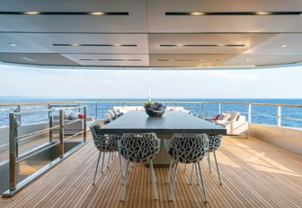 alfresco dinning on the upper deck aft of luxury yacht GIRAUD