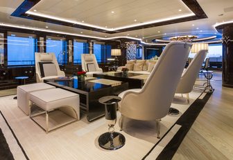 monchrome lounge in the main salon aboard charter yacht OKTO 