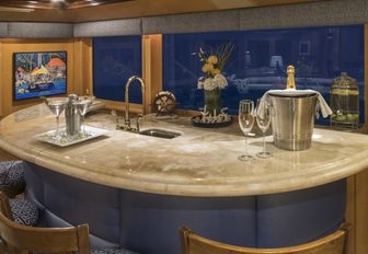 marble-topped bar in main salon of superyacht ‘Kelly Anne’ 
