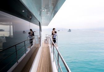 side balcony with wide side deck on board luxury yacht ONEWORLD 