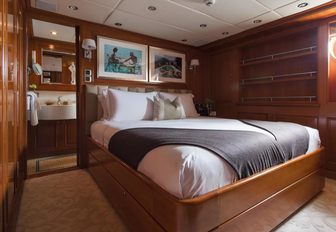 One of the guest cabins featured on board motor yacht RELENTLESS