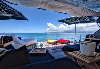 lounging setup on the beach club aboard superyacht Take 5