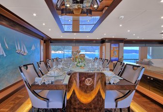 indoor formal dining area in main salon of luxury yacht MEIRA 