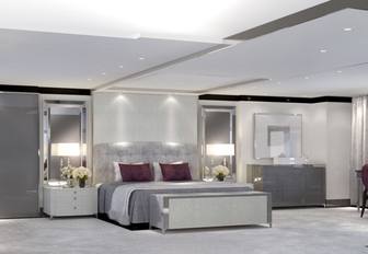 Owner's suite on motor yacht North Star, with grey bedding and grey carpets