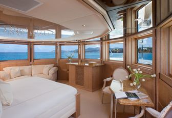 180-degree views through master suite aboard charter yacht SUNRISE 