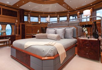 split-level master suite on board luxury yacht IMPROMPTU with large bed