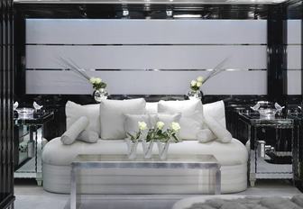 Comfortable seating area and table on superyacht Silver Angel