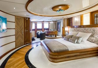 large master suite with full-length windows on board charter yacht LEGEND