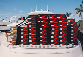shoe boxes of Air Jordan 1 Retro High OG trainers lined up on board motor yacht Julia Dorothy 