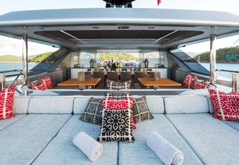 sunpads and seating area on the sundeck of charter yacht SLIPSTREAM
