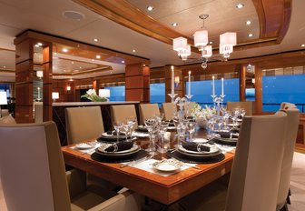 formal dining table in the main salon of motor yacht IMPROMPTU 