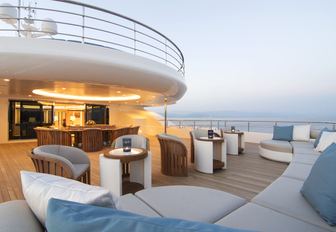 upper deck aft with alfresco dining and seating areas