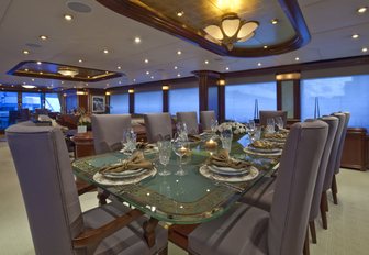 The formal dining featured in the interior of superyacht 'Zoom Zoom Zoom'