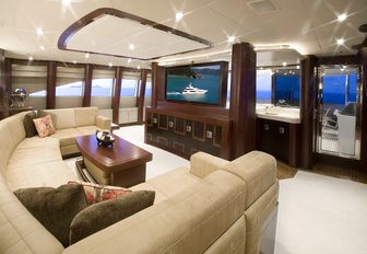 widescreen TV and large sofa in skylounge aboard motor yacht ‘De Lisle III’ 
