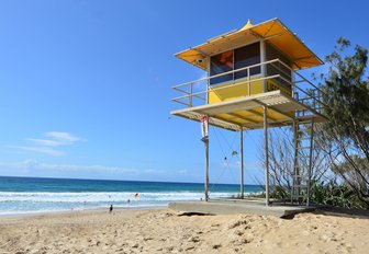 A lifeguard tower on white sandy beach of the Gold Coast, Queensland, Australia