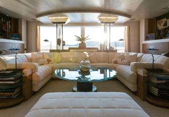 main salon with beach club-inspired styling on board superyacht Coral Ocean