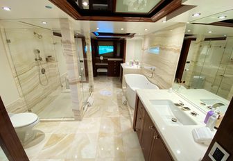Ensuite with shower and bath on superyacht Chasing Daylight