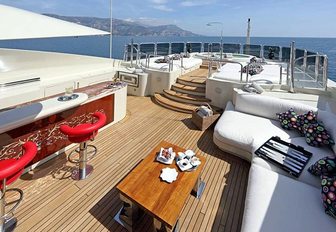 sundeck of luxury yacht ULYSSES equipped with bar, lounge area, Jacuzzi and sunning options
