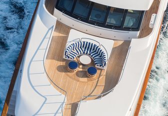secluding foredeck seating area on board motor yacht Air