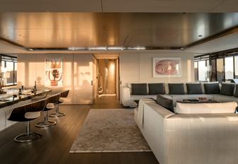 skylounge with bar and large seating area on board superyacht Grace E