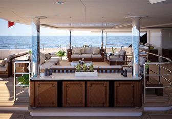 alfresco seating area on main deck aft of charter yacht spectre