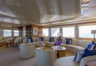 Main salon on charter yacht Lady Ellen II, with plenty of cream and neutral tones and lots of natural light