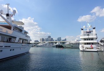 superyachts sparkling in the sunshine at the Miami Yacht Show @ Collins Avenue